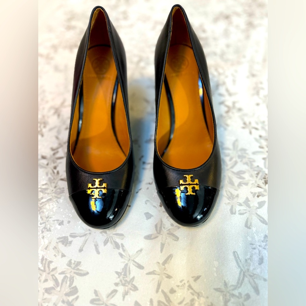 Tory Burch, size 7, black wedge shoe, 85 mm heel height. Excellent condition.